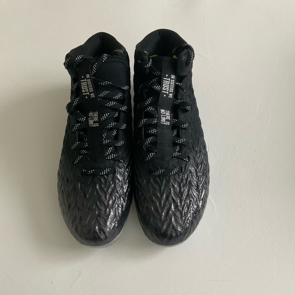 Never worn Women football cleats